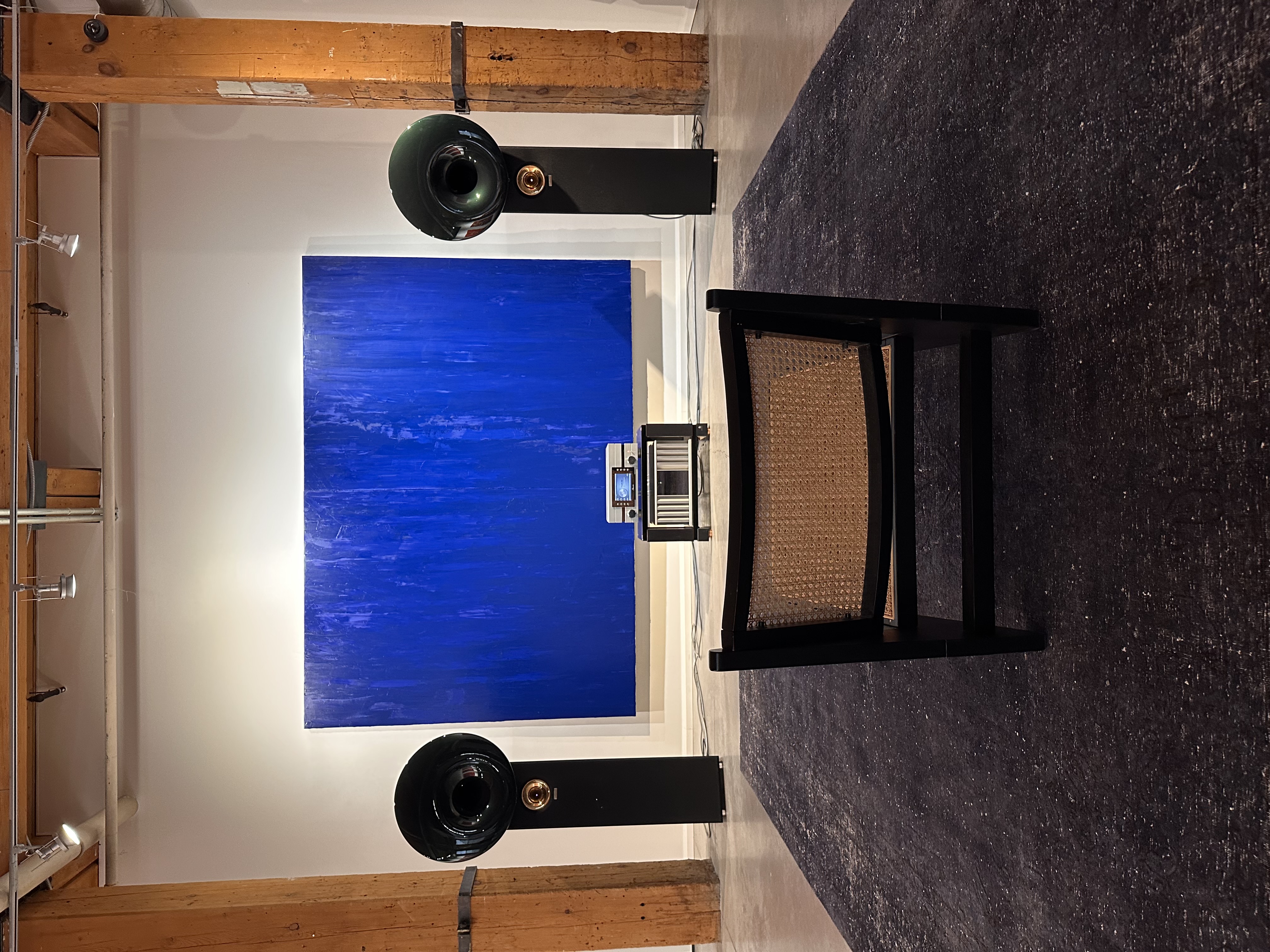 Acapella Room — High Violon horns flanking the Klein blue painting